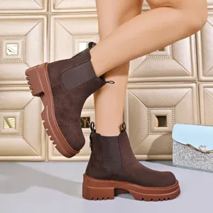 Brown suede Chelsea boots for women with thick platform rubber sole, comfortable daily wear.