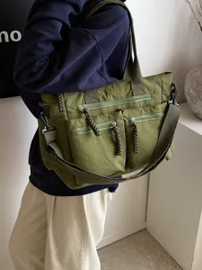 Korean style minimalist nylon multi-pocket shoulder bag and crossbody bag for women.