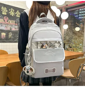 Großer Kapazität Schulrucksack für Schüler mit süßem Hunde-Anhänger und tollem Design.