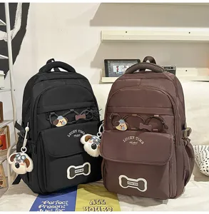 Großer Kapazität Schüler Schulrucksack mit süßem Hundekuscheltier und mehreren Fächern.