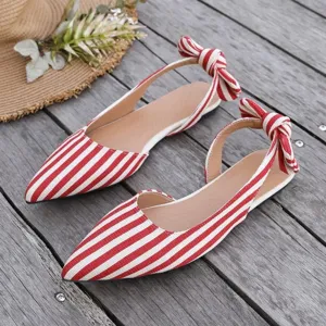 Red and white striped slingback flat shoes with a pointed toe and cute bow for summer.