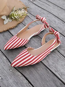 Red and white striped slingback flat shoes detail view, pointed toe with back bow accent.