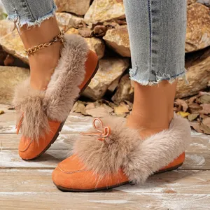 Women's winter plush warm flat shoes orange cozy fluffy cotton slip-on casual footwear.