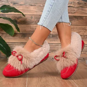 Women fluffy winter plush flat shoes with warm faux fur trim and cute red bow detail.