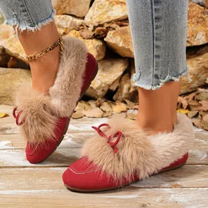 Winter warm plush flat shoes detail showcasing soft fuzzy faux fur trim and comfortable lining.