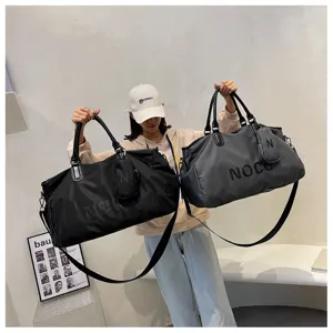 Large capacity travel duffel bag gym sports tote bag for men and women weekend luggage.