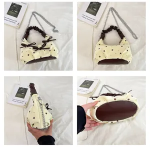 Korean style star print handbag detail view, brown bow chain crossbody bag showcase.