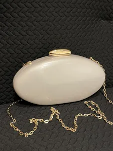 Elegant oval acrylic evening clutch bag with gold chain strap for women chic party bag