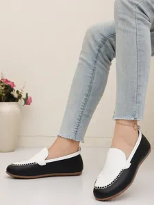 Detailansicht Damen Slipper Color-Block flache Schuhe, Schwarz-Weiß mit Ziernähten.