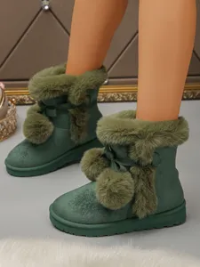 Dark green women short snow boots with plush cuff bow and pom pom details for winter