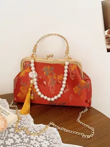Borsa a conchiglia ricamata in stile cinese con manico di perle borsa da sera chic.