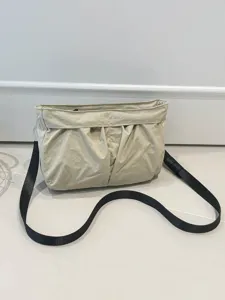 Minimalistische beige nylon schoudertas met zwarte riem casual tas voor dames dagelijks