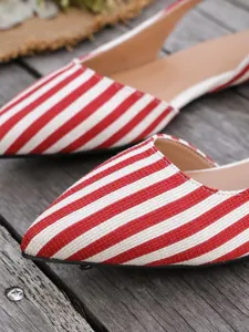 Red and white striped pointed-toe slingback flat shoes, casual summer footwear detail.