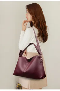 Stylish burgundy women shoulder bag large capacity tote bag elegant daily handbag detail.