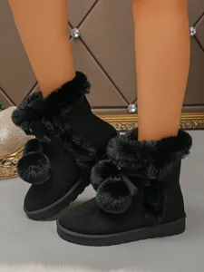 Women black short snow boots with plush fur trim bow and cute pom-poms warm thick bottom