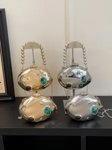 Borsa da sera in metallo con gemma verde design astratto unico elegante pochette di lusso donna.