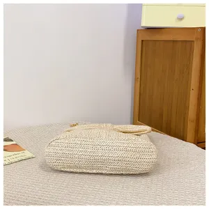 Damen Stroh geflochtene Umhängetasche Sommer lässiger ländlicher Stil Leinen Textur Handtasche Detail.