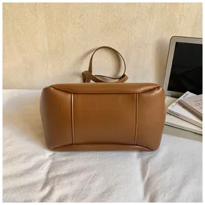 Detailed view of a stylish brown PU leather tote bag, perfect for daily casual and work wear.