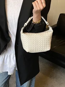 White woven crescent shoulder bag for women, stylish vintage dumpling handbag.