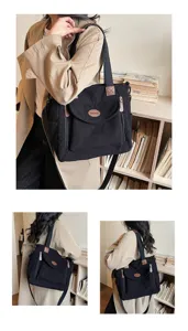 Black corduroy tote bag for women, casual shoulder bag with top handle and front pocket.