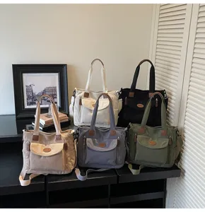 Corduroy tote bag detailed display featuring multiple color choices and functional pockets.