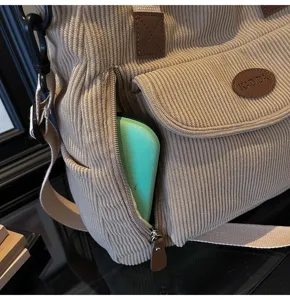 Casual corduroy shoulder tote bag daily commute handbag textured fabric detail view