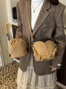 Stylish khaki suede mother-child bucket bag set, chic crossbody shoulder handbag for women.