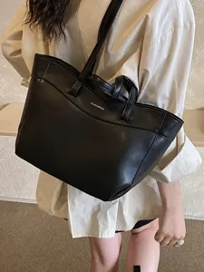 Black large capacity tote bag for women, stylish PU leather shoulder bag for daily use.