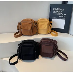 Detail view of retro canvas multi-pocket crossbody bag, casual shoulder bag in four colors.