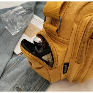 Yellow suede camera bag chic crossbody shoulder bag for women fashion outdoor daily use.