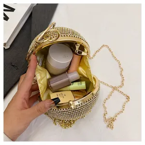 Sac de soirée boule en strass élégant avec poignée anneau métallique et chaîne.