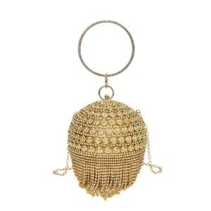 Sac de soirée sphérique en strass doré avec une poignée ronde pochette élégante