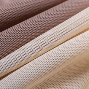 Detailed view of breathable mesh fabric texture, soft material close up for innerwear.