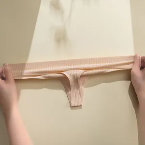 Seamless ribbed women's thong in solid nude color, comfortable stretch underwear main photo
