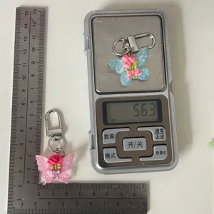 Transparant bloem vlinder sleutelhanger detail, schattige tas hanger accessoire cadeautje.