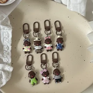 Quirky ugly-cute black doll keychain novelty bag charm aesthetic accessory cute gift