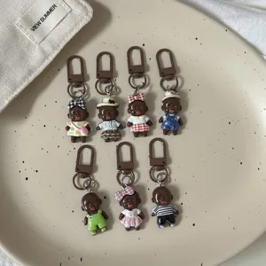Cute ugly cartoon black doll keychain set, creative funny bag pendant accessories for trendy daily use
