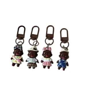 Funny ugly cute black doll keychain creative bag pendant cute accessory fashion item gifts.