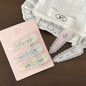 Detailed view of cute sweet lolita hair clips with lace edge, bear and rabbit design.