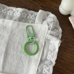 Set portachiavi con anello a molla verde e moschettone, ideale per accessori fai da te.