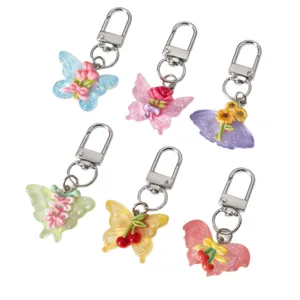 Leuke doorzichtige vlinder sleutelhanger set met bloem en fruit bedels voor tassen.