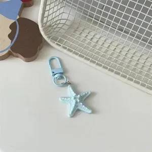Cute light blue 3D starfish keychain bag pendant aesthetic accessory for daily outfits.