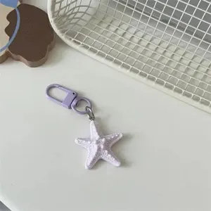 Cute purple 3D starfish keychain bag charm aesthetic cute aesthetic backpack pendant accessory.