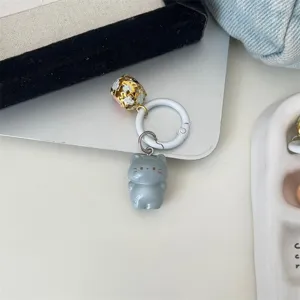 Adorable grey cat keychain with bell pendant, cute cartoon bag charm for student gift.