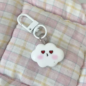 Cute cloud keychain with red heart eyes and pink blush design, ideal for sweet style bags or keys.