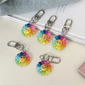 Colorful flower emoji keychain, cute resin rainbow flower bag charm for student backpack gifts.