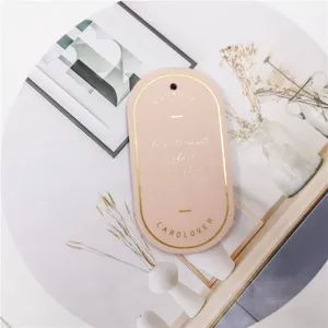 Oval leather bookmark with gold stamped text minimalist page marker reading assistant gift