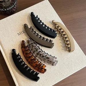 Matte and glossy banana hair clips set, stylish vertical hair claws for chic ponytails.