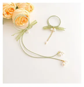 Elastico per capelli verde stile Mori mughetto fiocco nappa accessori eleganti