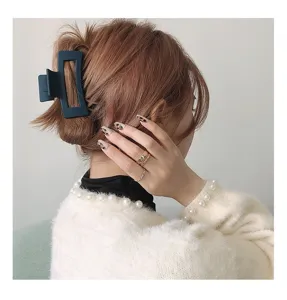 Korean minimalist matte rectangular hair claw clip for elegant styling, dark blue finish.